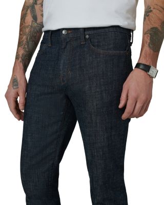 The Brixton Straight Slim Fit Jeans in Riker