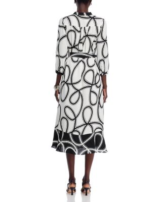 The Mila Dotted Midi Dress