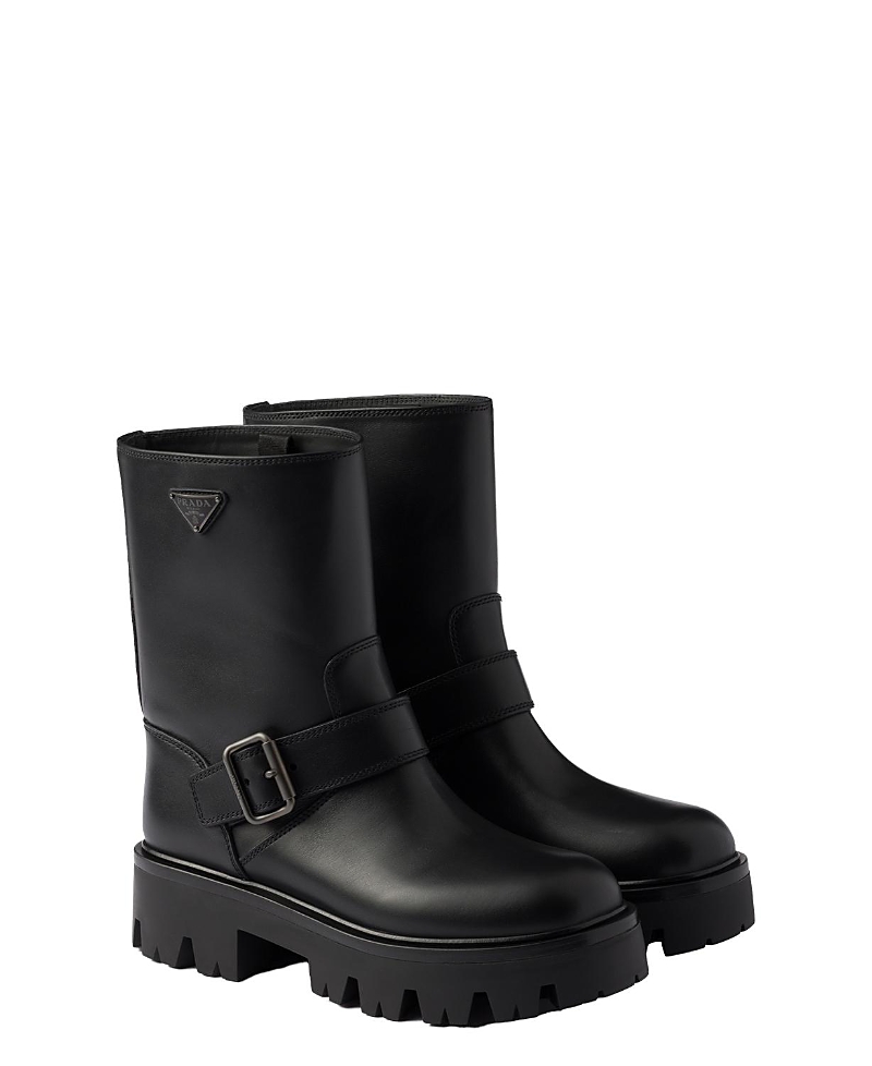 Prada Buckle-fastening Lug-sole Boots In Black