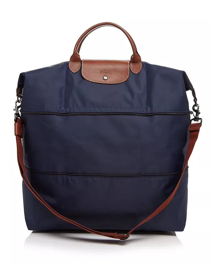 Le Pliage Expandable Travel Duffel Nylon Weekender (in Black/Gold)
