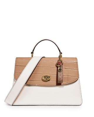 coach turnlock edie carryall