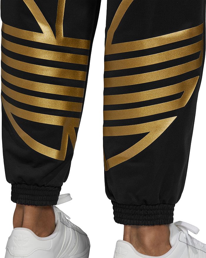 zeno trefoil track pants