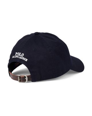 white and black polo hat