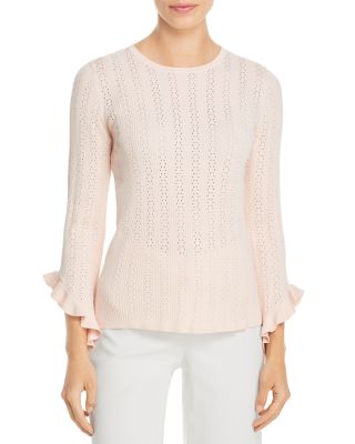 pink designer sweater