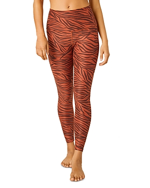 Beyond Yoga Caught In The Midi High Waisted Animal Print Legging In Orange Jas