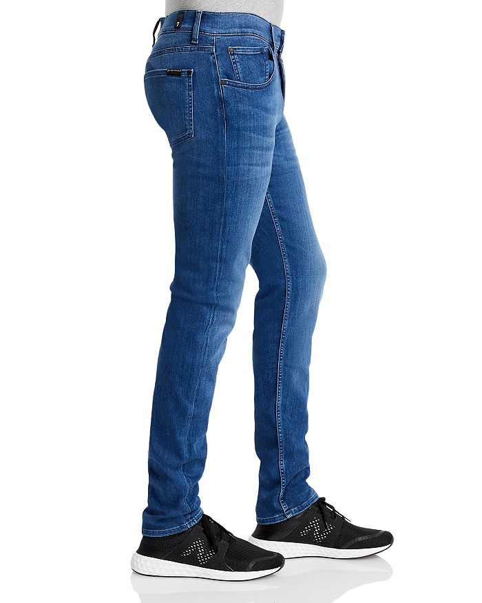 Shop 7 For All Mankind Luxe Performance Plus Slimmy Tapered Slim Fit Jeans In Mid Blue