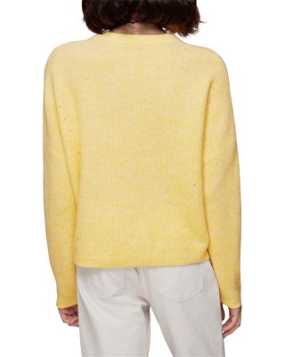 misses yellow sweater