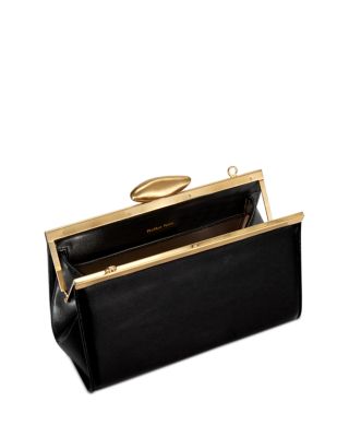 black and gold clutch