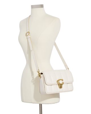 white crossbody coach