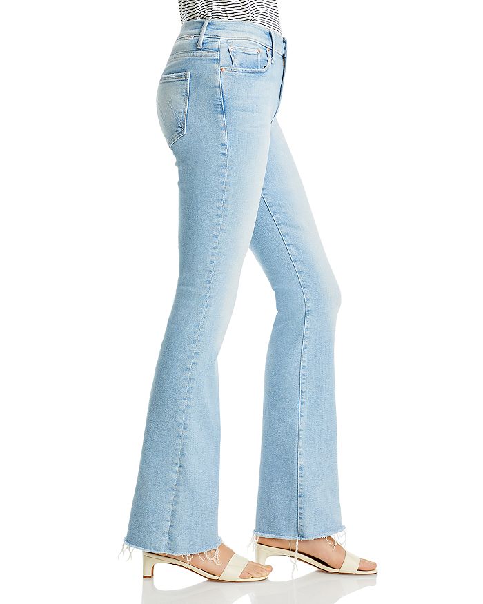 Shop Mother The Weekender Mid Rise Flared Jeans In California Cruiser