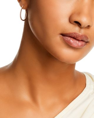 Diamond Inside Out Oval Hoop Earrings in 14K Yellow Gold, 0.75 tcw