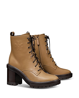 Tory Burch Logo Embossed Lug Sole Bootie In Almond Flour