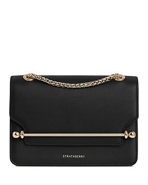 Shop Strathberry East/west Leather Mini Crossbody In Black/gold