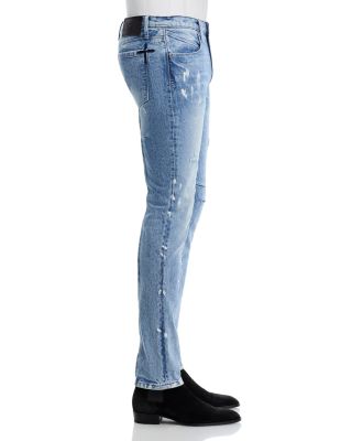 Distressed Jeans in Medium Blue