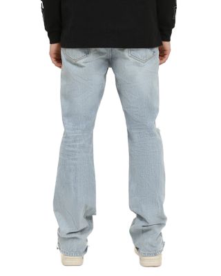 Lucca Fade Bootcut Distressed Jeans in Light Indigo