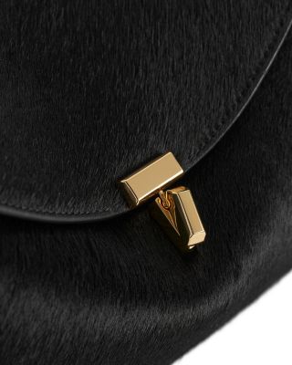 T Lock Calf Hair Convertible Clutch