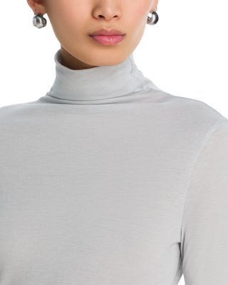 Elavu Mock Neck Top