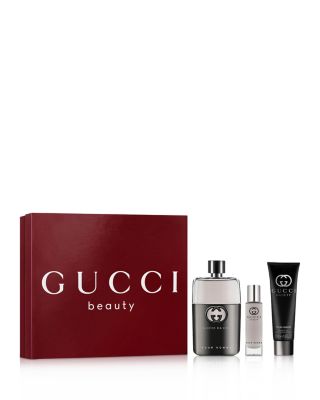 Guilty Pour Homme Eau de Toilette for Men and Shower Gel Trio Gift Set ($189 value)