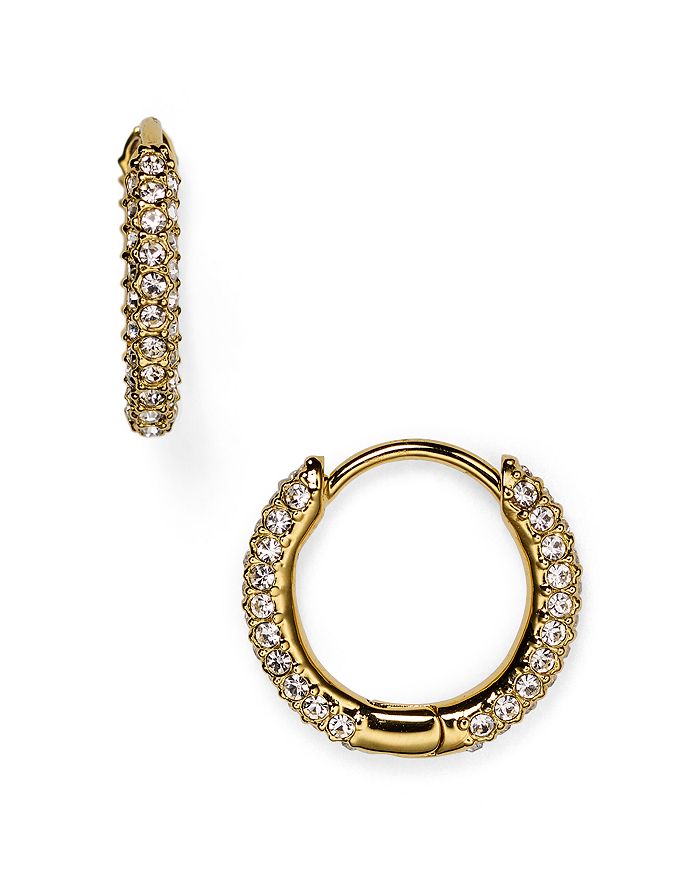 Shop Nadri Huggie Hoop Earrings In Gold
