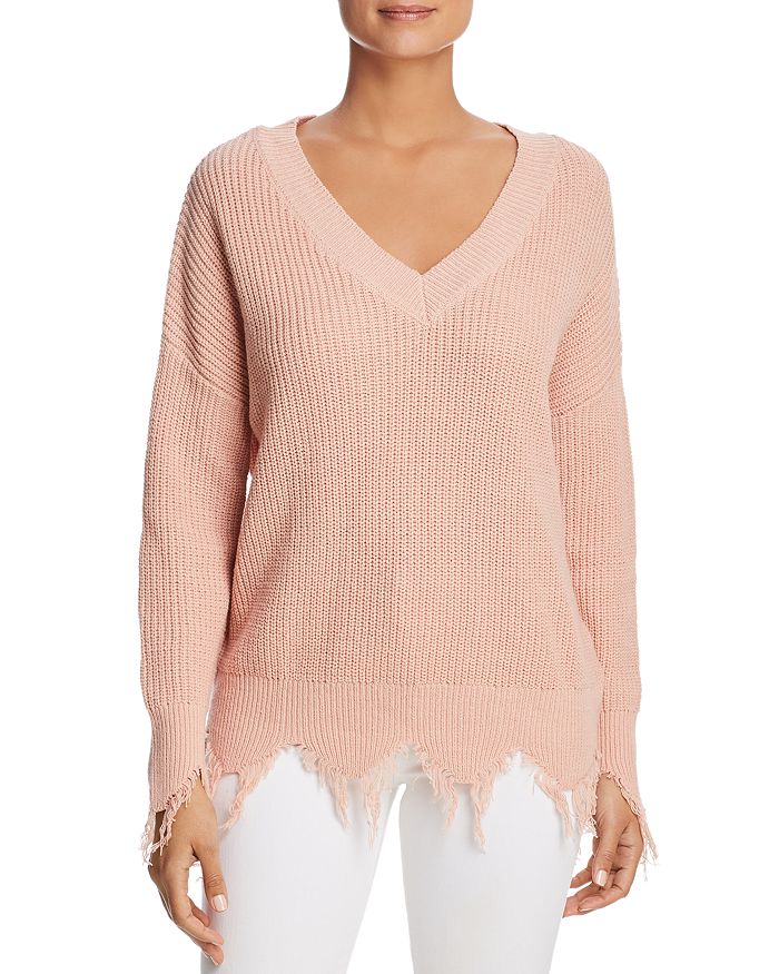 Frayed outlet trim sweater