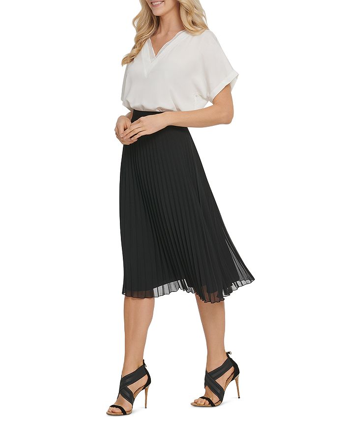 Shop Dkny Pull-on Pleated Skirt In Black