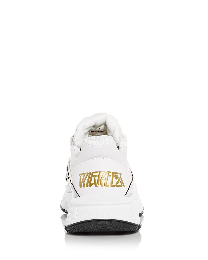 Shop Versace Men's Trigeca Low Top Sneakers In White+gold