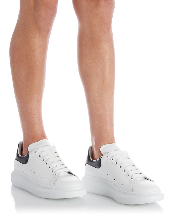 Shop Alexander Mcqueen Men's Oversized Leather Heel Detail Sneakers In White/black