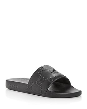 Gucci - Men's GG Embossed Slide Sandals