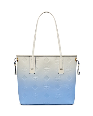 Shop Mcm Liz Small Maxi Monogram Embossed Leather Shopper Bag In Della Robbia Blue/gold