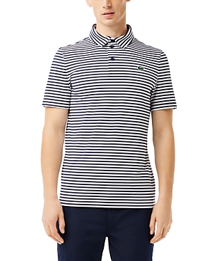 Shop Lacoste Regular Fit Logo Golf Polo Shirt In 525 Navy B