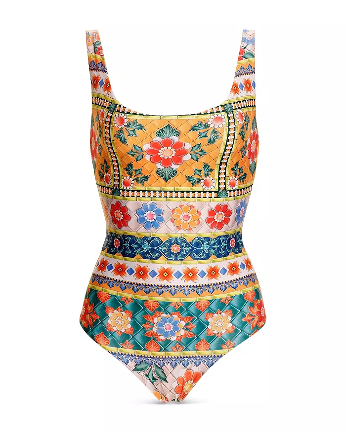 model wearing multi colored koraline tile reversible swimsuit