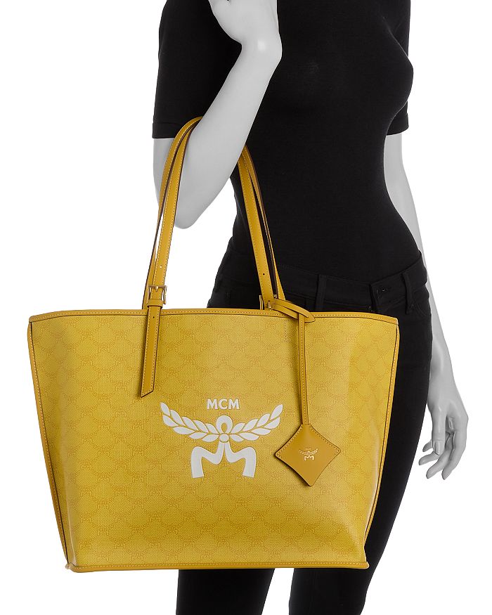 Shop Mcm Himmel Medium Lauretos Shopper Tote In Lemon Gold
