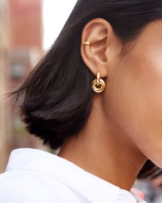 Camilla Circle Charm Huggie Hoop Earrings in Gold Tone  