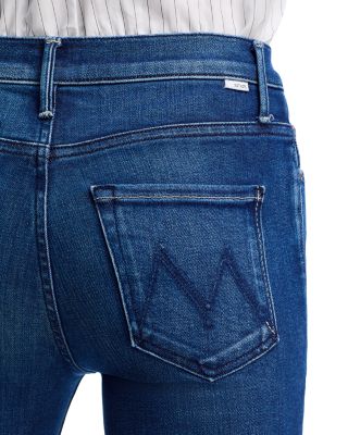 The Weekender Mid Rise Flared Jeans in Nip It In The Butt