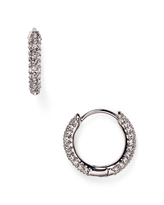 Shop Nadri Huggie Hoop Earrings In Silver