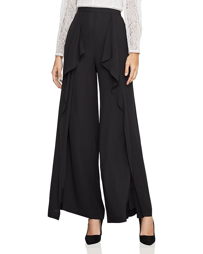 Bcbgmaxazria Jackie Draped Slit Wide Leg Pants In Black Modesens We love this versatile look with simple sandals. jackee ruffled wide leg pants