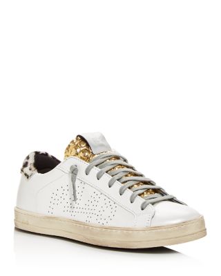 p448 gold sneakers
