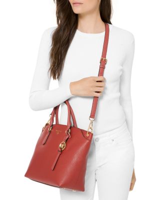 red and brown mk purse