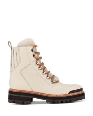 cream designer boots