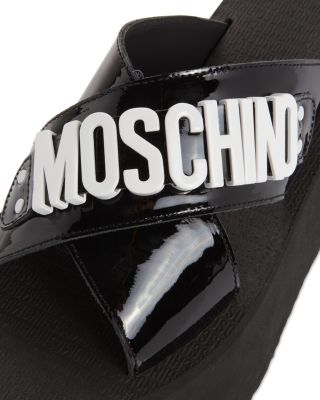 サンダル・ミュール Moschino Platform Sandal Moschino Women's Logo Crossover Platform Sandals