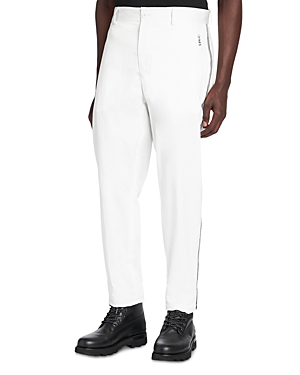 Shop Moncler Side Stripe Trousers In Cream