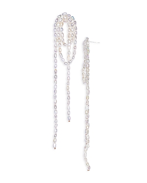 Shop Shashi Imitation Pearl Knotted Shoulder Sweeping Drop Earrings In White