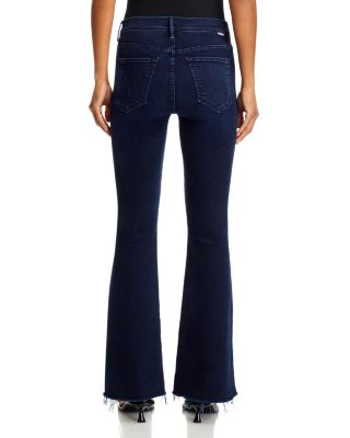 The Weekender Mid Rise Flared Jeans in Chip On My Shoulder