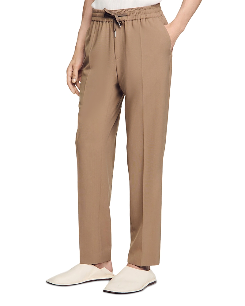 Sandro Elasticated Straight-leg Trousers In Dark Sand