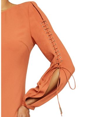 Aries Long Sleeve Shift Dress with Grommet Detail