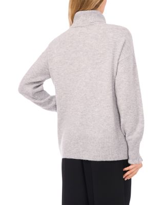 Embroidered Ribbon Turtleneck Sweater