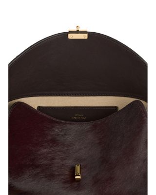 T Lock Calf Hair Convertible Clutch