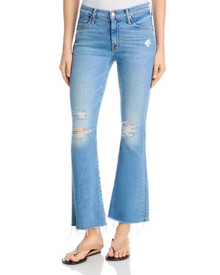 Lil Weekender Low Rise Frayed Flare Jeans in Chaos Is Calling