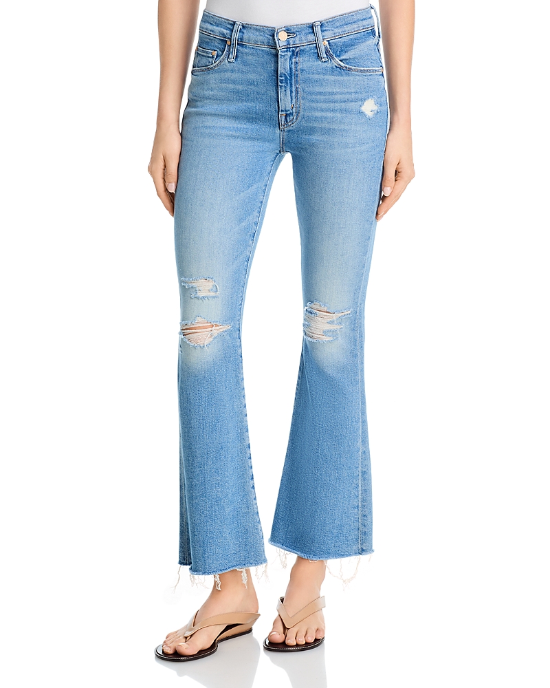Mother Lil Weekender Low Rise Frayed Flare Jeans in Chaos Is Calling
