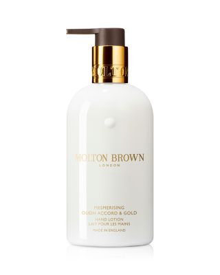 Mesmerising Oudh Accord & Gold Hand Lotion 10 oz.